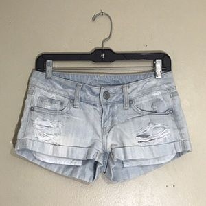 light wash distressed american eagle shorts